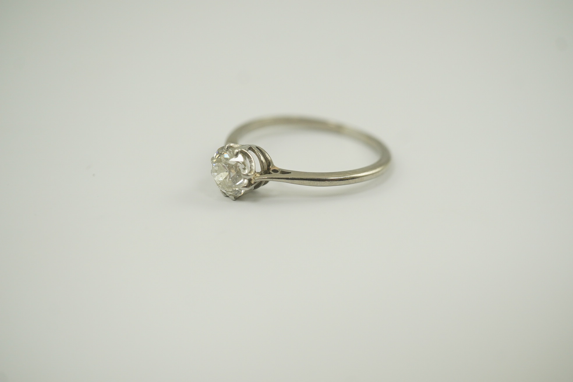 A platinum? and solitaire diamond set ring